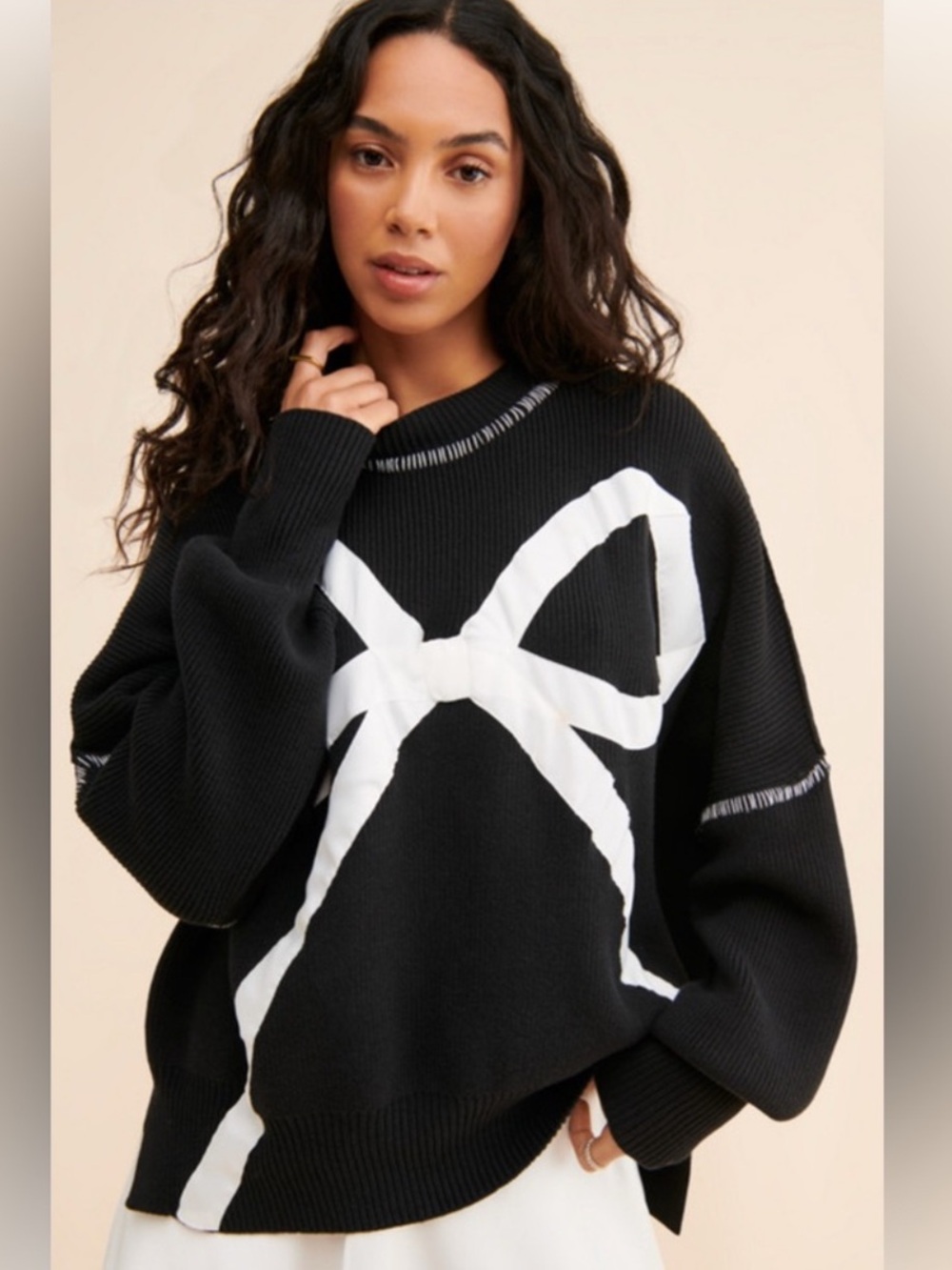 Tricia Fix exploted bow Black Sweater FP collab White Bow Graphic